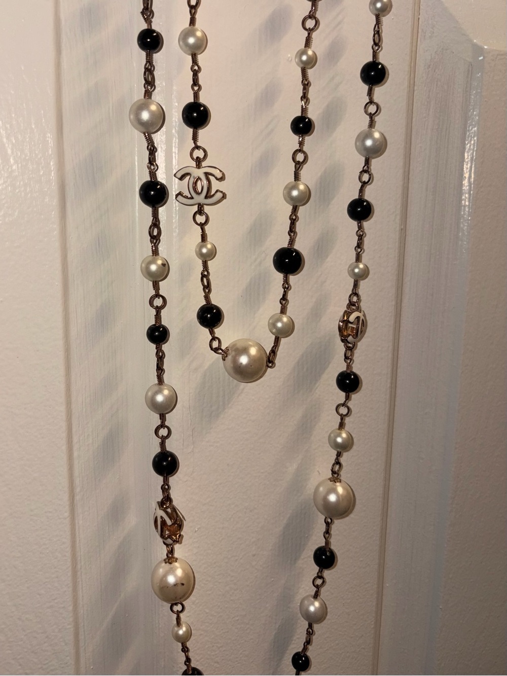 CHANEL Black and Ivory Faux Pearl CC Charm Long Necklace